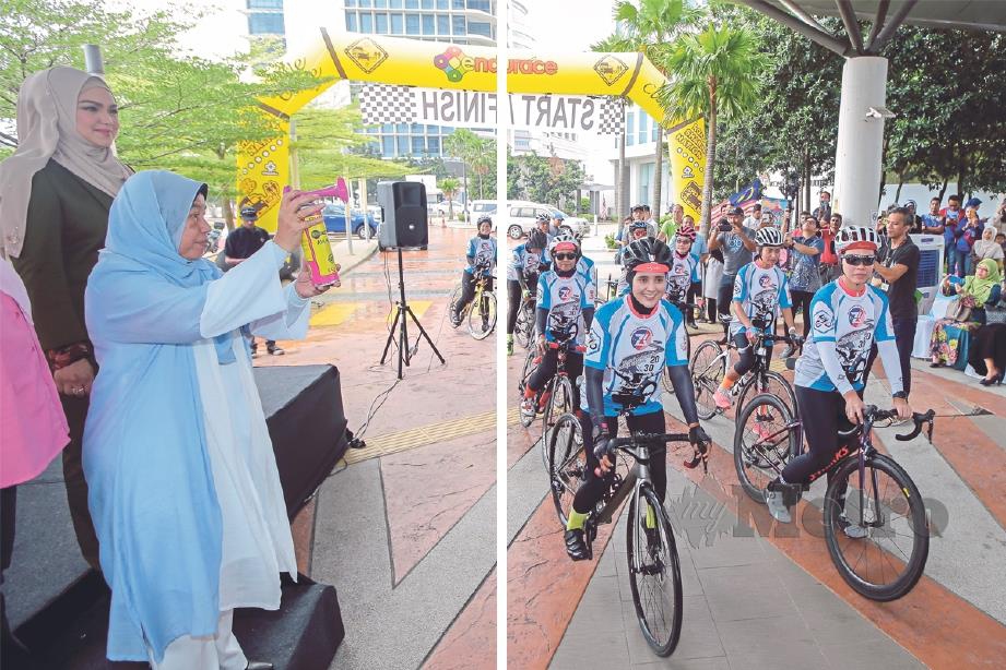 SITI mengiringi Menteri Perumahan dan Kerajaan Tempatan, Zuraida Kamaruddin pada majlis pelancaran progrom Kayuhan Wanita 2019 Galak Hidup Sihat di Putrajaya, Rabu lalu.