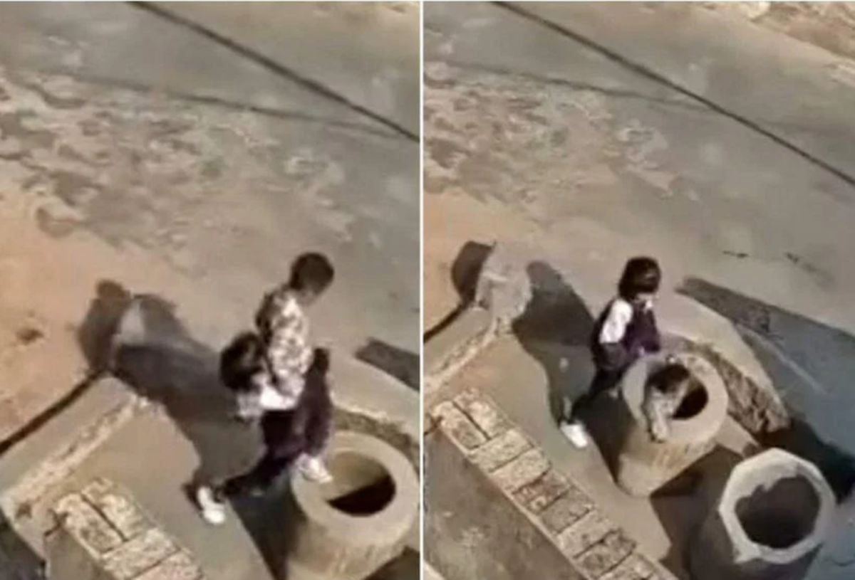 TANGKAP layar daripada video di YouTube menunjukkan kanak-kanak perempuan mencampak anak kecil ke dalam perigi. 