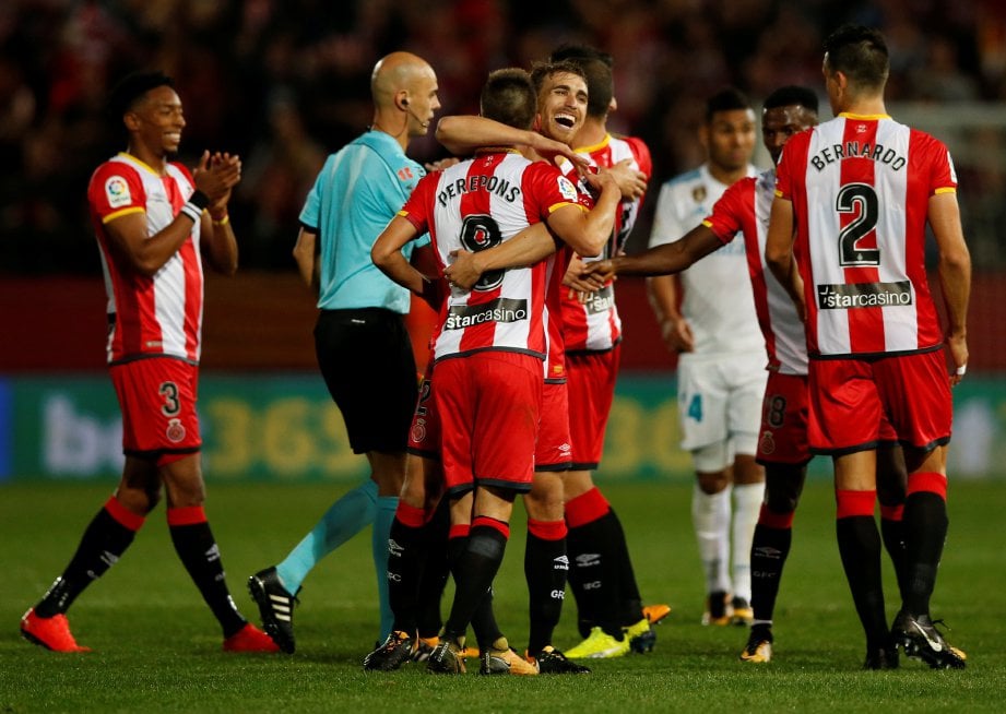 PEMAIN Girona meraikan kejayaan menewaskan Real. FOTO/AFP