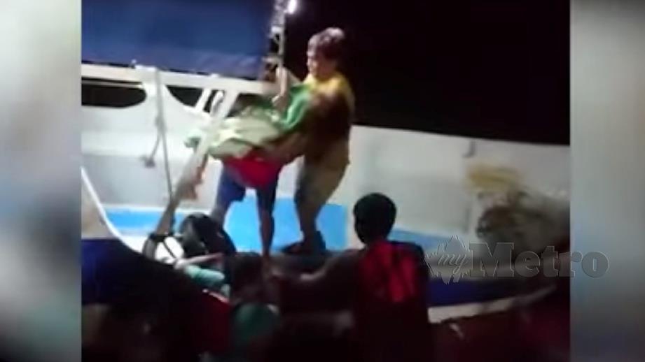 PETIKAN rakaman video menunjukkan wanita yang diselamatkan oleh nelayan di Straits Quay