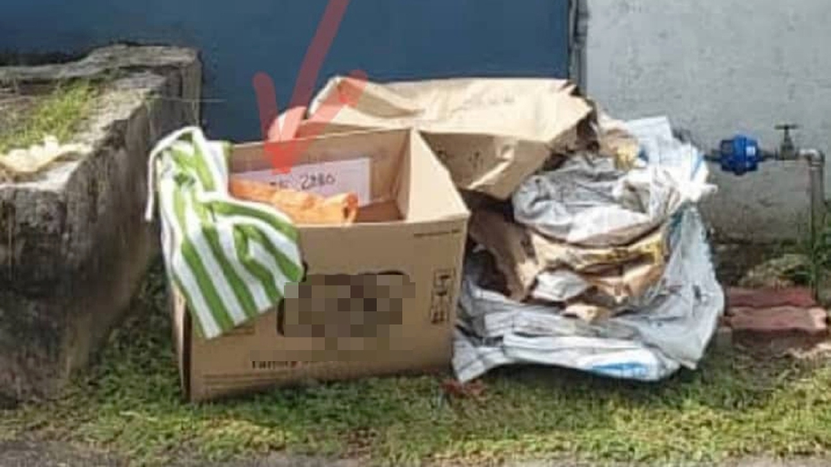 MAYAT bayi perempuan ditemui di dalam kotak sampah di hadapan sebuah rumah kebajikan. FOTO ihsan Polis