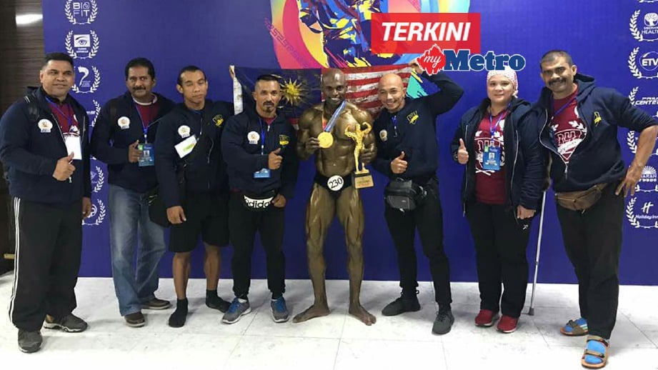 MOHD Syarul (empat kiri) mempertahankan gelaran Mr Universe pada Kejohanan Bina Badan Dunia dan Sukan Fizik.
