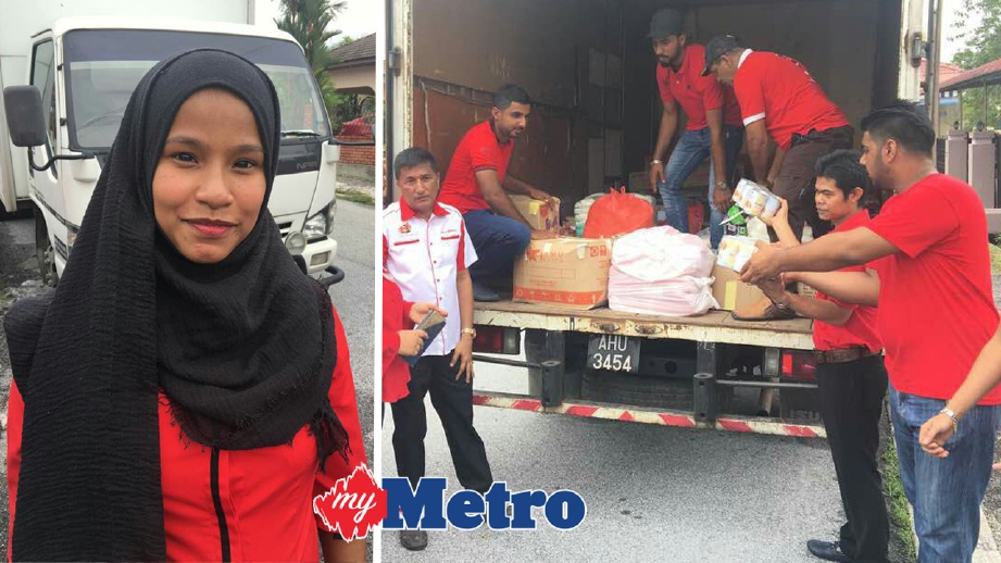 NUR Fariza (kiri) antara 30 sukarelawan BATAS Perak yang membawa makanan keperluan asas untuk disalurkan kepada mangsa banjir di Bukit Mertajam, Pulau Pinang. FOTO Razif Rosli
