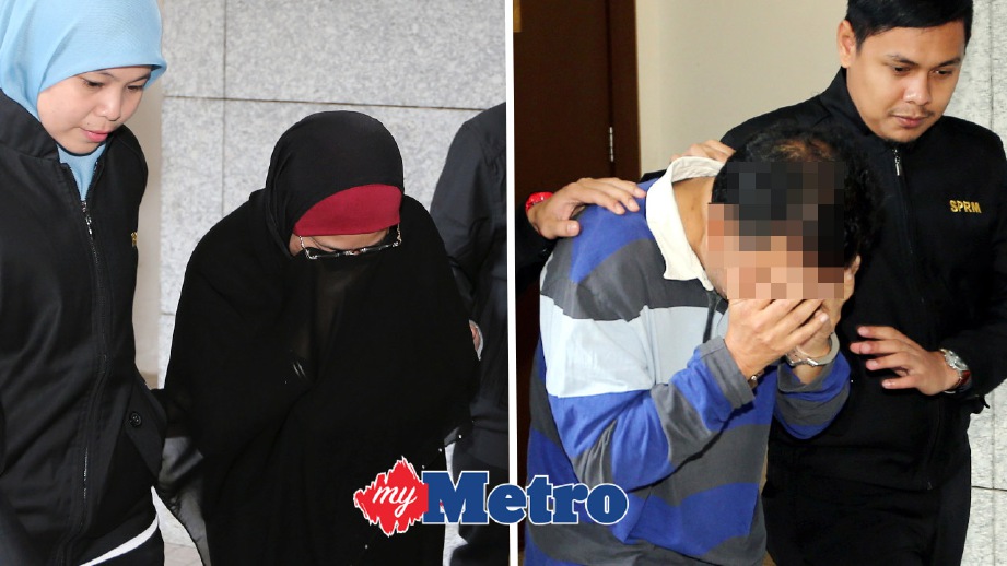SUAMI isteri dibawa ke Mahkamah Majistret Putrajaya. FOTO Abd Rahim Rahmat