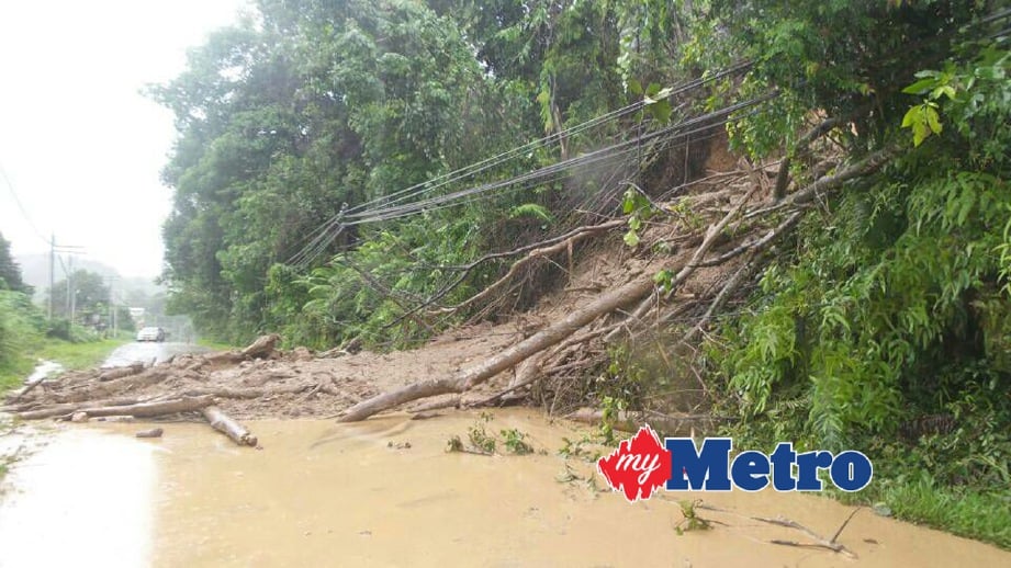 KEADAAN tanah runtuh Jalan Kiulu-Tamparuli berhampiran Kampung Malangang, Kiulu. FOTO Recqueal Raimi