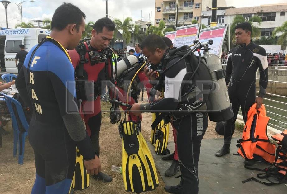 BOMBA akan menggunakan kaedah selaman oleh anggota Pasukan Penyelamat Di Air (PPDA) Balai Bomba dan Penyelamat (BBP) Kuala Berang bagi mencari mangsa. FOTO Ghazali Kori