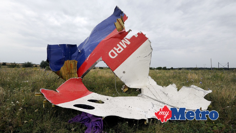 SERPIHAN pesawat MH17 di Shakhtarsk, Ukraine pada 2014. FOTO AFPDOMINIQUE FAGET
