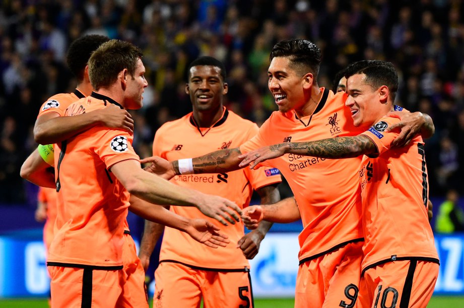 PEMAIN Liverpool meraikan kemenangan mereka ke atas Maribor. -Foto AFP