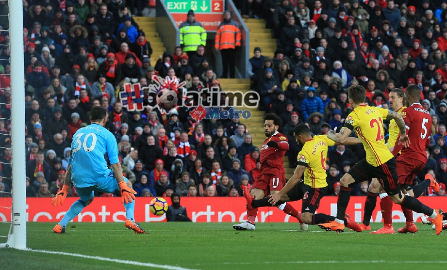 GOL pertama Liverpool jaringan Salah (tengah). -Foto AFP