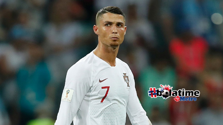 CRISTIANO Ronaldo selepas Portugal tewas kepada Uruguay di Sochi. FOTO AFP