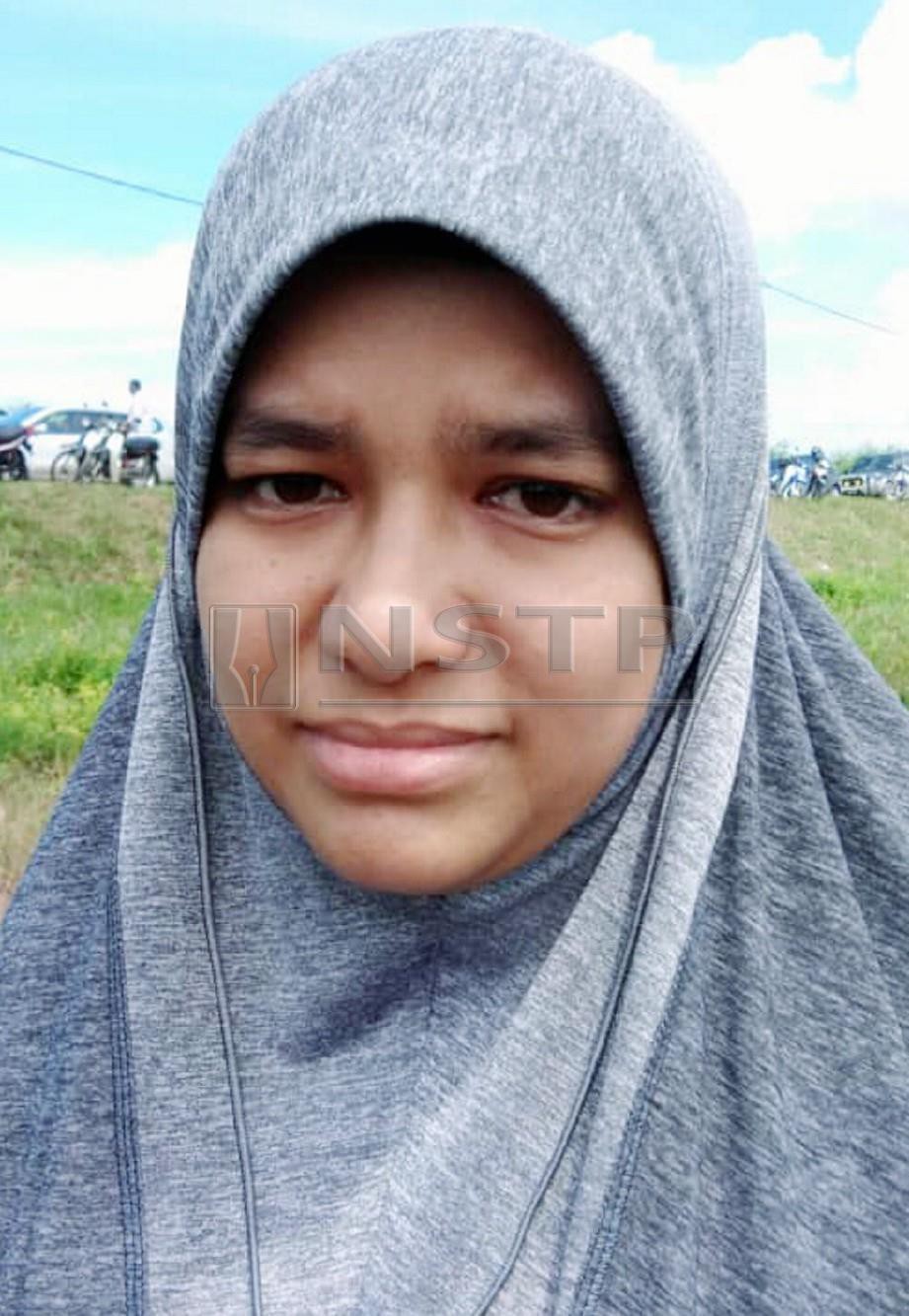 ISTERI paraglider yang maut selepas terjatuh ke dalam Sungai Muda, Kota Kuala Muda, Asiah Yahya. FOTO Nor Farhani Che Ad