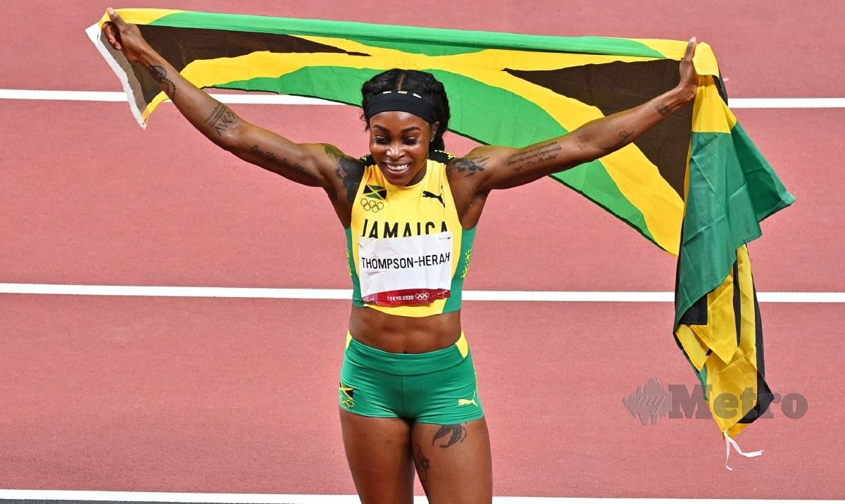 RATU pecut Jamaica, Elaine Thompson-Herah menang emas acara 200m wanita di Tokyo 2020, hari ini. FOTO AFP