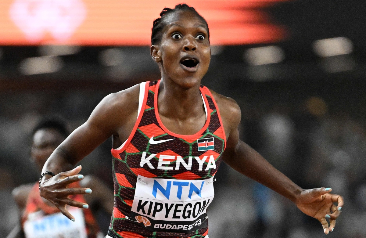 FAITH meraikan kemenangan dalam acara 1500m wanita. FOTO AFP