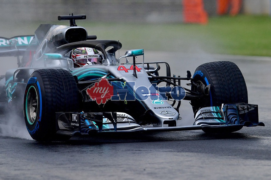 PEMANDU Mercedes, Lewis Hamilton rakam masa terpantas pada sesi ujian kelayakan perlumbaan GP Hungary. FOTO AFP