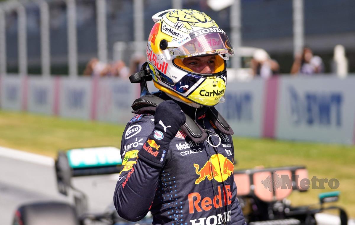 PEMANDU Red Bull, Max Verstappen meraikan kejayaan bermula di petak utama selepas sesi kelayakan Formula Satu GP Styri, hari ini. FOTO AFP