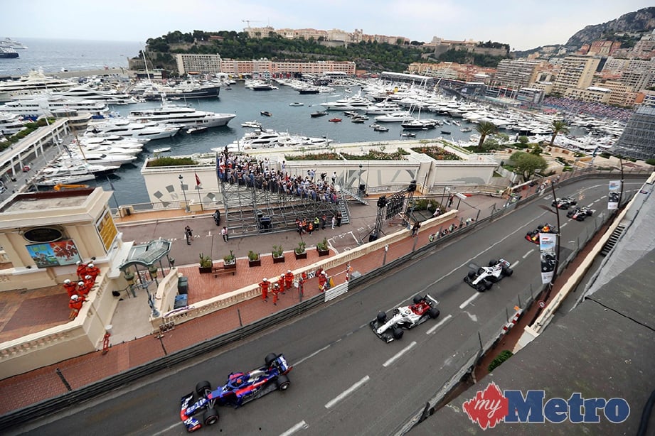 HAMILTON dan Alonso menyifatkan Grand Prix Monaco sebagai perlumbaan yang membosankan. FOTO/AFP 