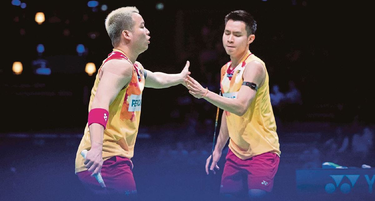AARON (kiri), Wooi Yik berjanji dalam mana-mana kejohanan sertai akan beri yang terbaik. FOTO AFP