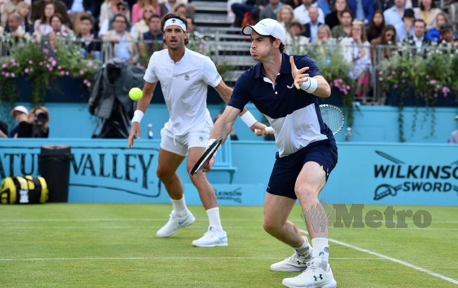 Gandingan Murray (kanan) dan Lopez catat kemenangan pusingan awal di Kejohanan ATP Fever-Tree, London. FOTO AFP
