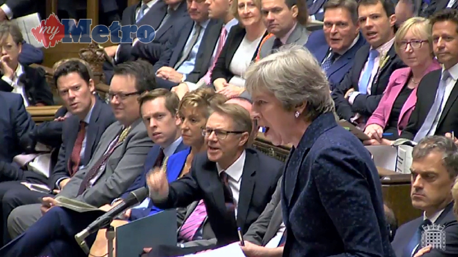 Theresa pada sesi Prime Minister’s Questions di London. FOTO AFP
