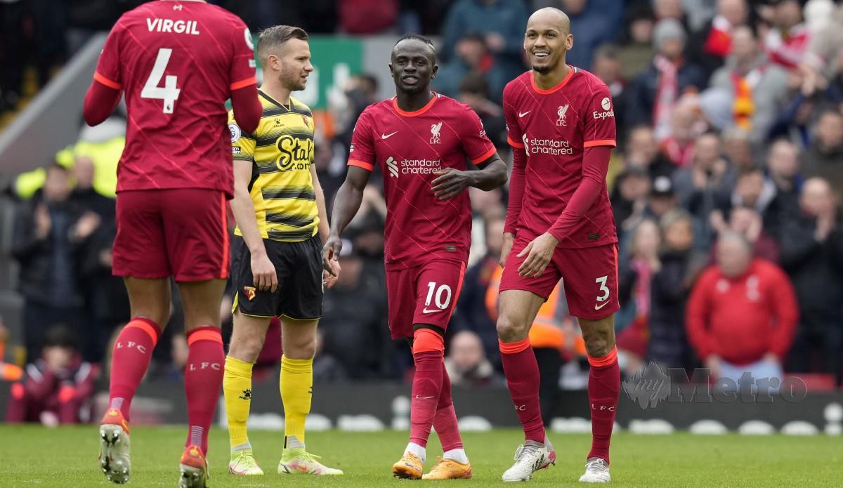 FABINHO (kanan) berjaya menyumbang gol kedua Liverpool pada hujung perlawanan. FOTO EPA