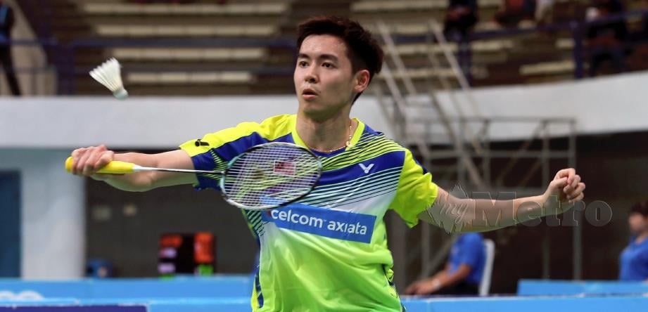 JUNE Wei  atasi cabaran pemain Indonesia.