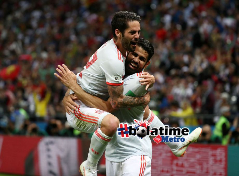 DIEGO Costa meraikan gol kemenangan Sepanyol. Foto REUTERS