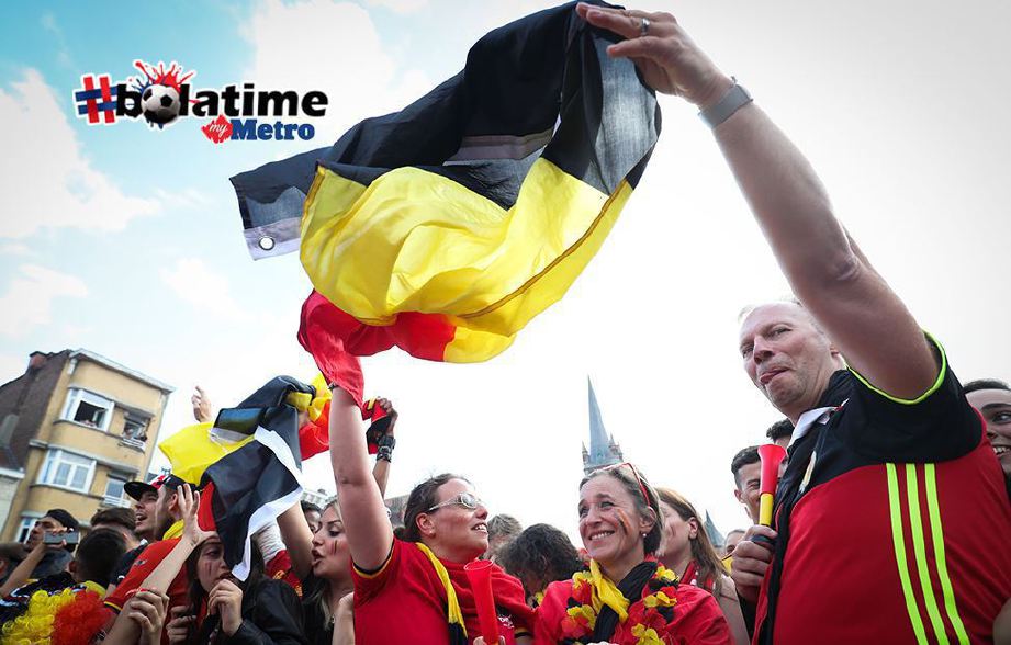 PENYOKONG Belgium gembira meraikan kemenangan. FOTO/AFP 