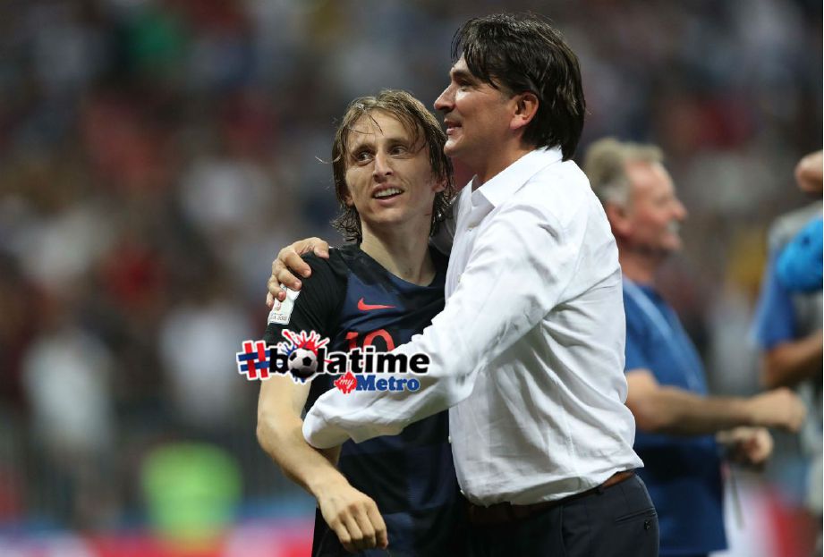 DALIC memeluk Modric selepas berjaya menewaskan England 2-1. Foto/REUTERS