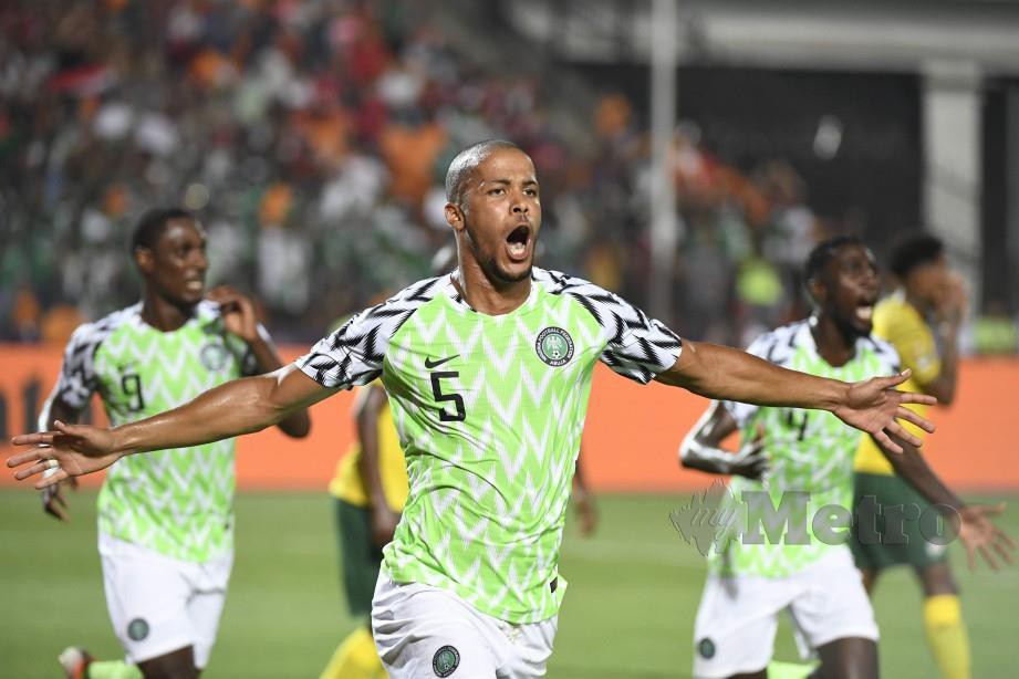 Pemain pertahanan Nigeria, William Troost Ekong meraikan jaringannya dalam aksi Piala Negara Afrika. FOTO AFP