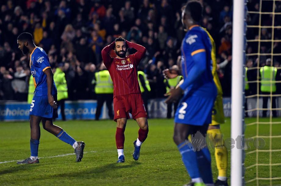 REAKSI Mohamed Salah ketika perlawanan bertemu Shrewsbury. FOTO AFP