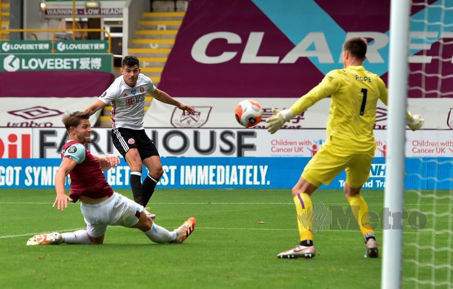 EGAN meledakkan gol penyamaan Sheffield di Turf Moor. FOTO AFP
