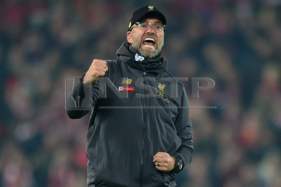 Reaksi gembira pengurus Liverpool Jurgen Klopp. FOTO AFP. 