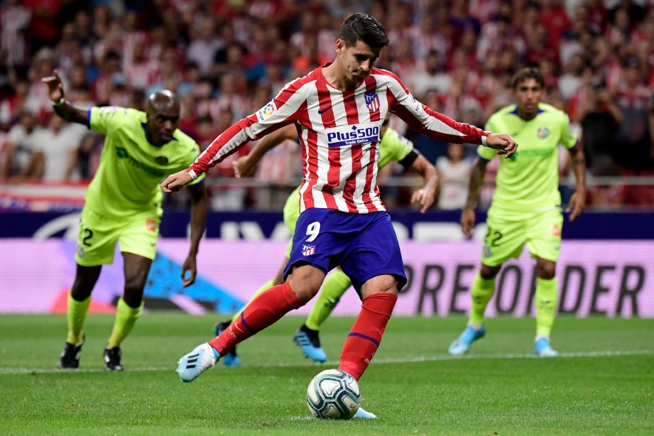 MORATA terlepas penalti ketika kelabnya memulakan kempen La Liga dengan kemenangan tipis 1-0 ke atas Getafe. FOTO AFP