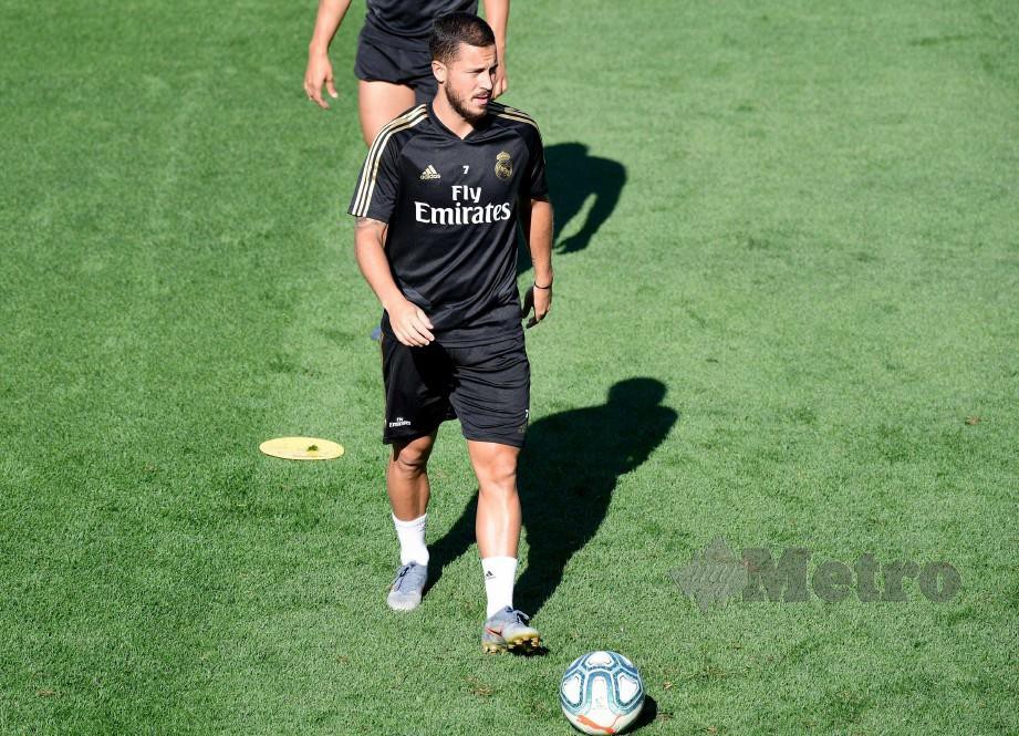 Eden Hazard menjalani latihan di Madrid. FOTO AFP