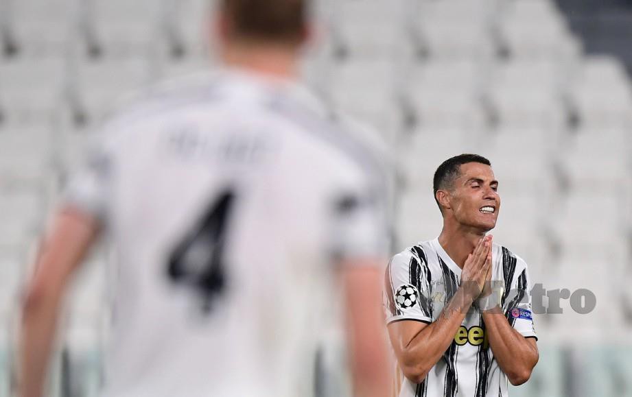 REAKSI kecewa Ronaldo. FOTO AFP 