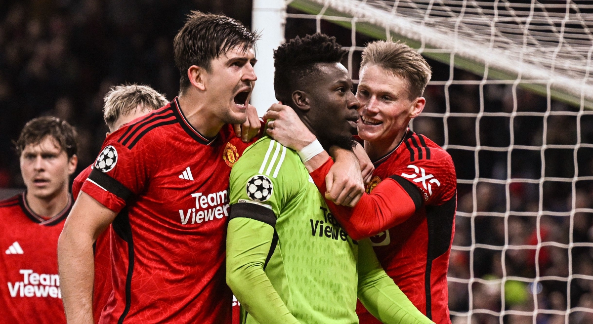 ONANA (tengah) dan Maguire (kiri) menjadi watak penting ketika menang 1-0 ke atas FC Copenhagen di Old Trafford, awal pagi Rabu lalu. FOTO AFP 