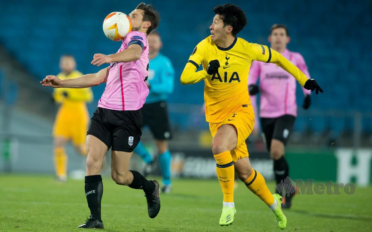 HEUNG Min (kanan) meledak gol kedua Spurs pada minit ke-56. FOTO AFP