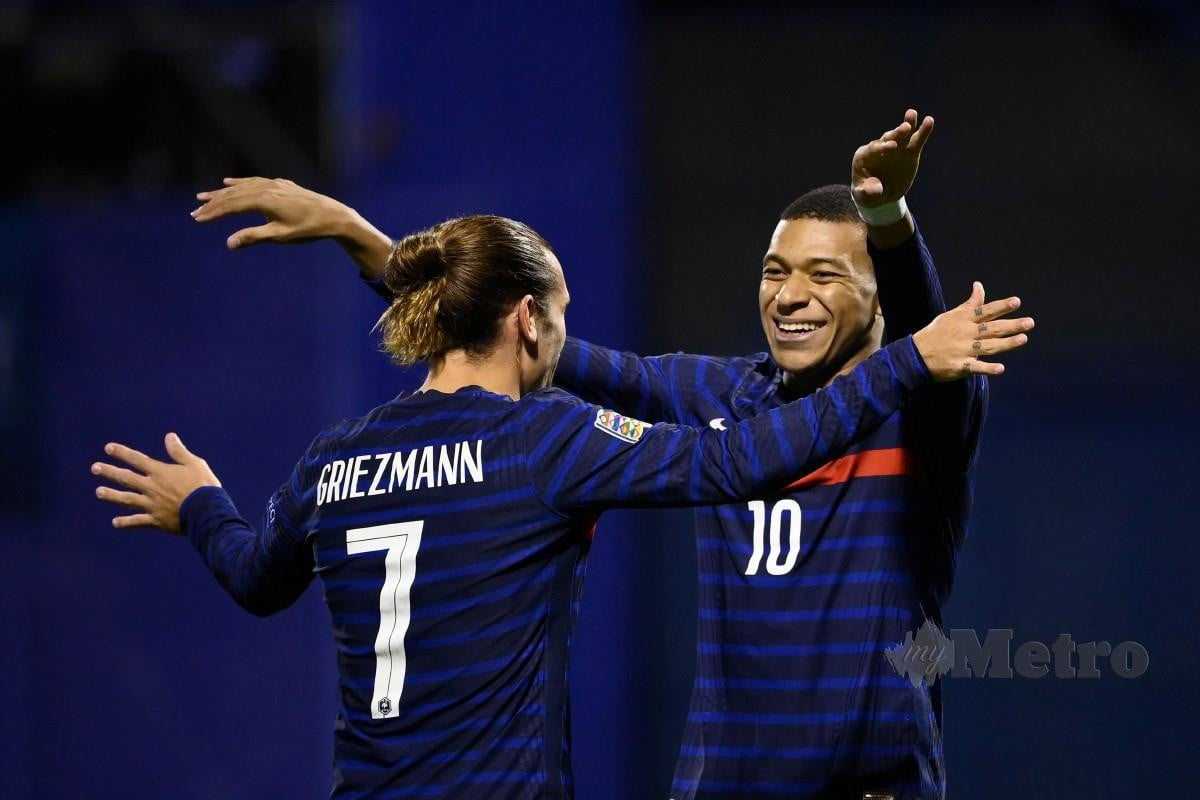 GRIEZMANN (kiri) dan Mbappe masing-masing menjaringkan gol untuk Perancis. FOTO AFP