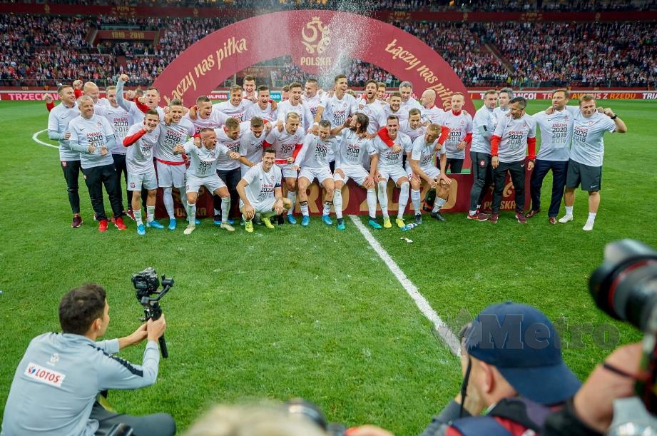 PEMAIN Poland meraikan kemenangan mereka dan seterusnya melayakkan diri ke Euro 2020.
