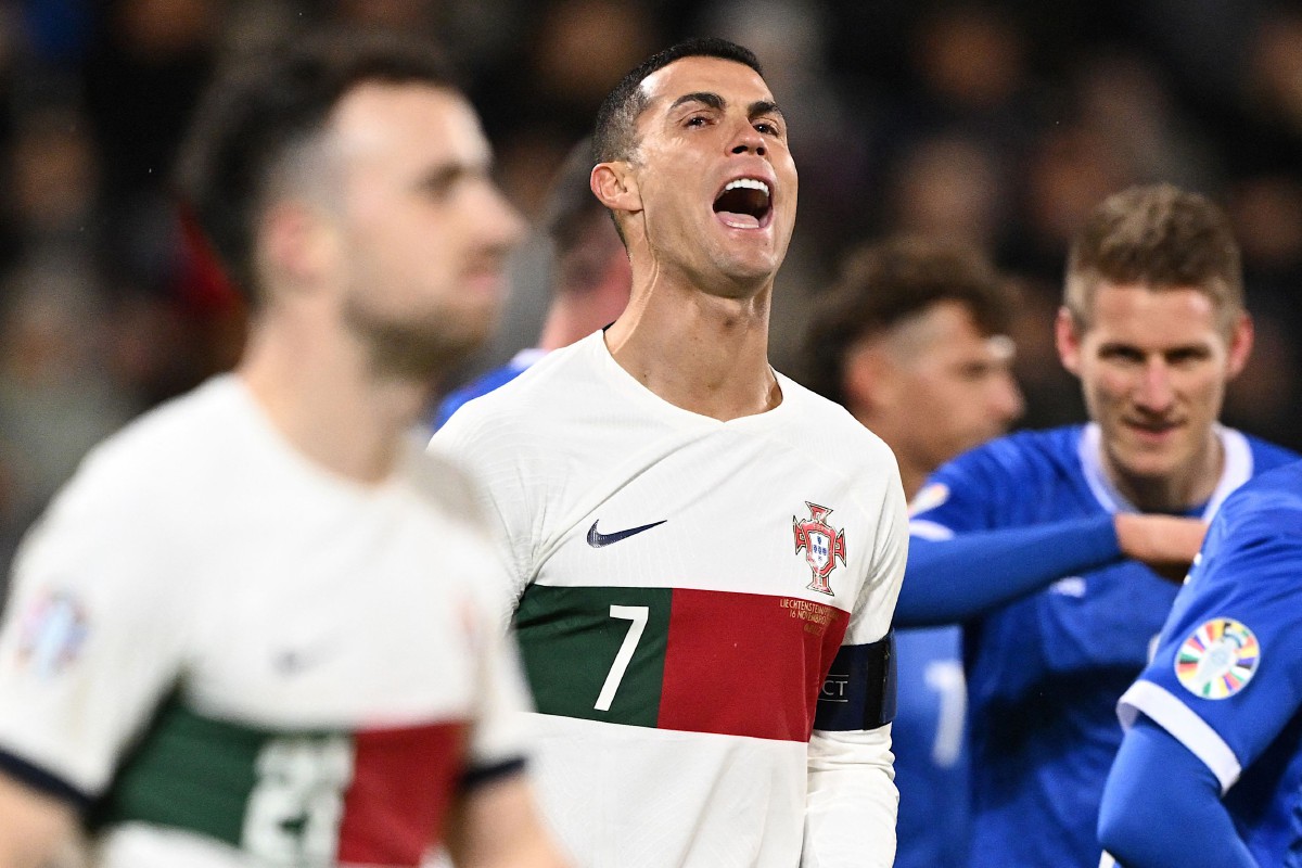 RONALDO menjerit puas selepas meledak gol buat Portugal. -FOTO AFP