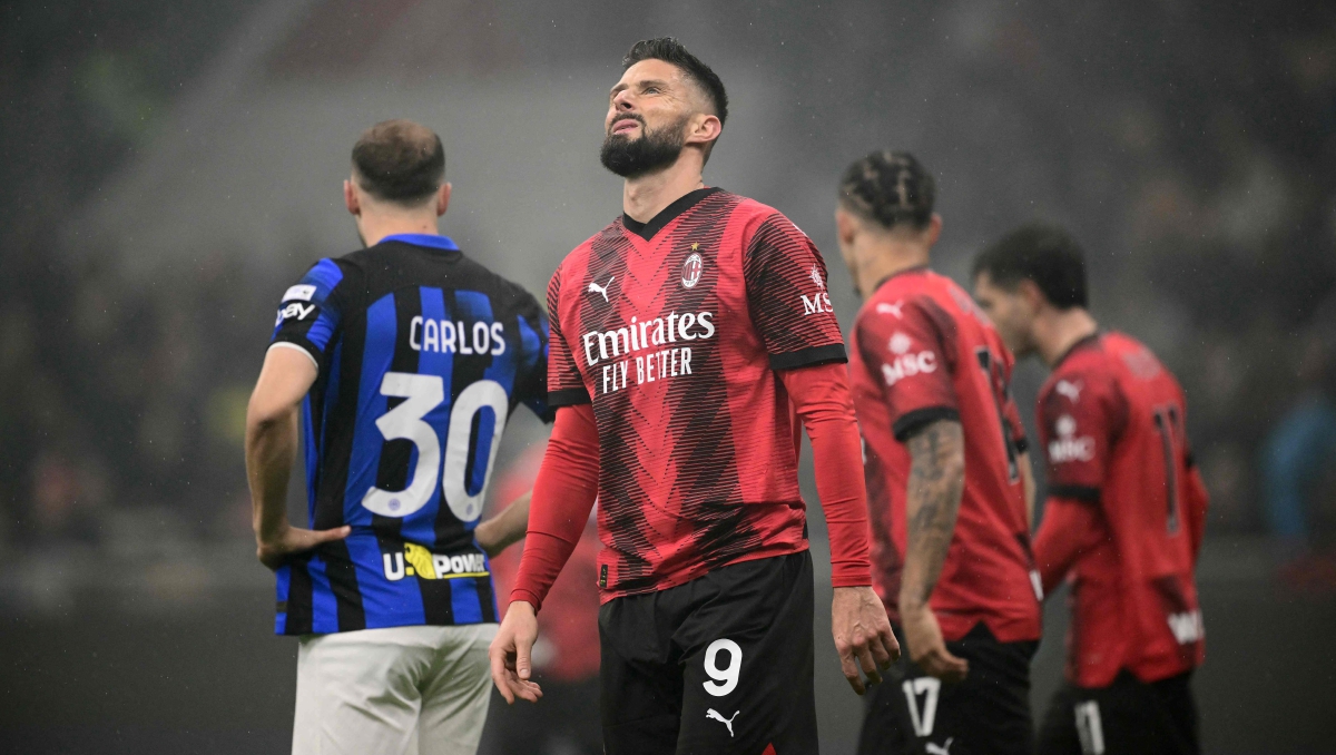 GIROUD kecewa selepas Mila tewas 1-2 kepada Inter yang menyaksikan Inter muncul juara Serie A bagi musim ini. FOTO AFP 