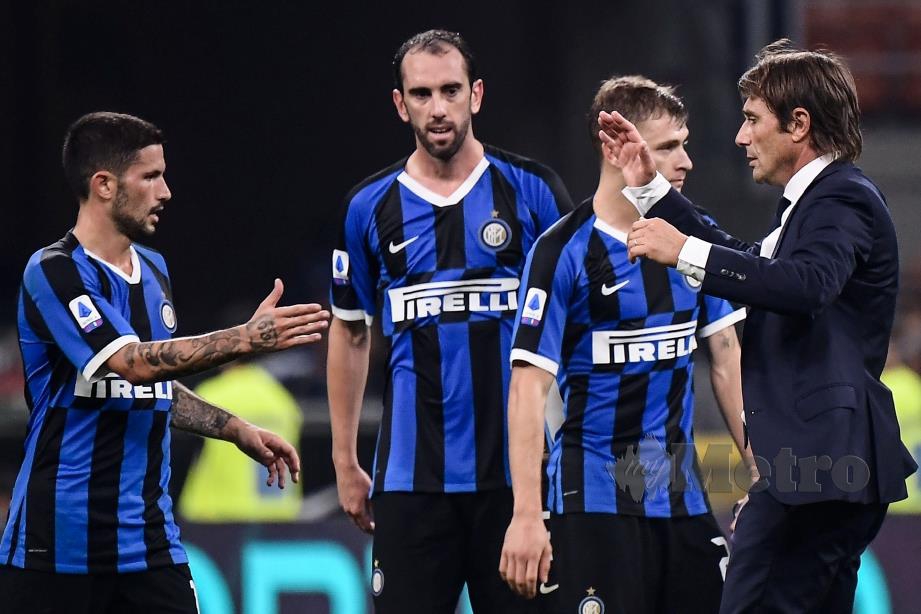 ANTONIO Conte meraikan kemenangan Inter Milan menentang Lazio awal pagi tadi.