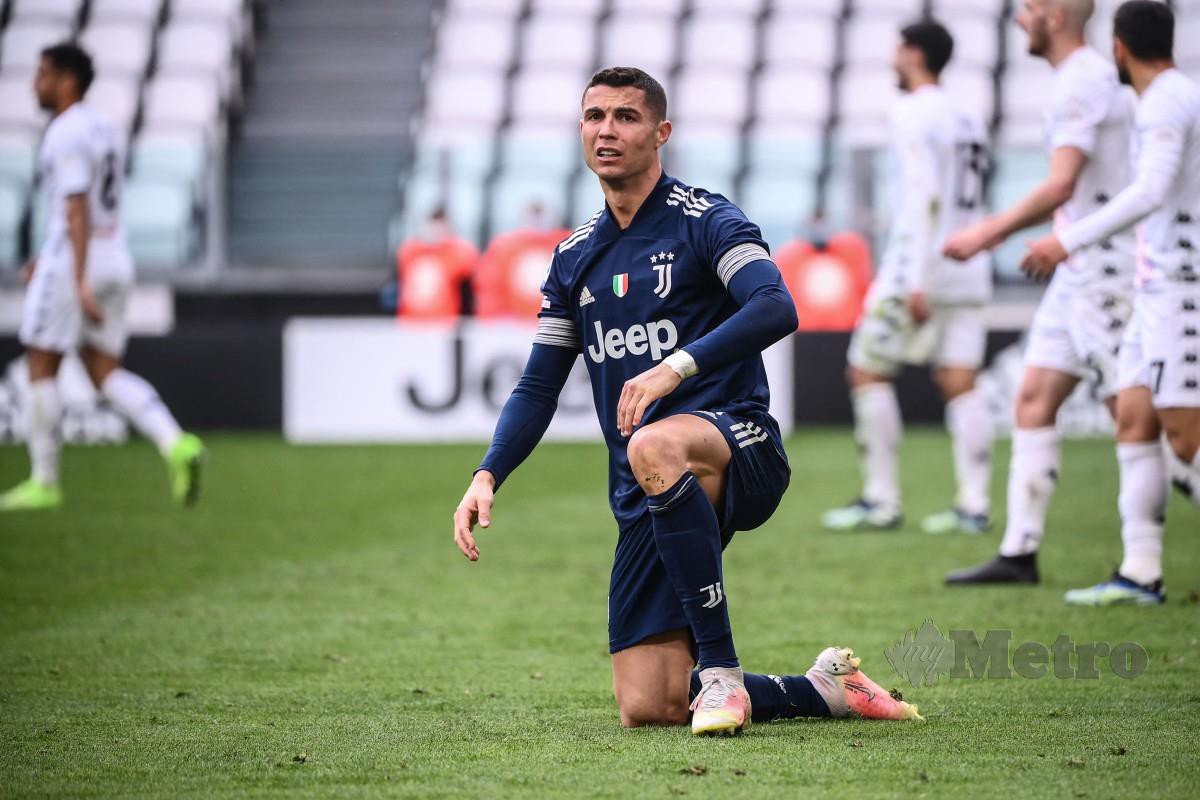 REAKSI kecewa Ronaldo pada perlawanan hari ini. FOTO AFP