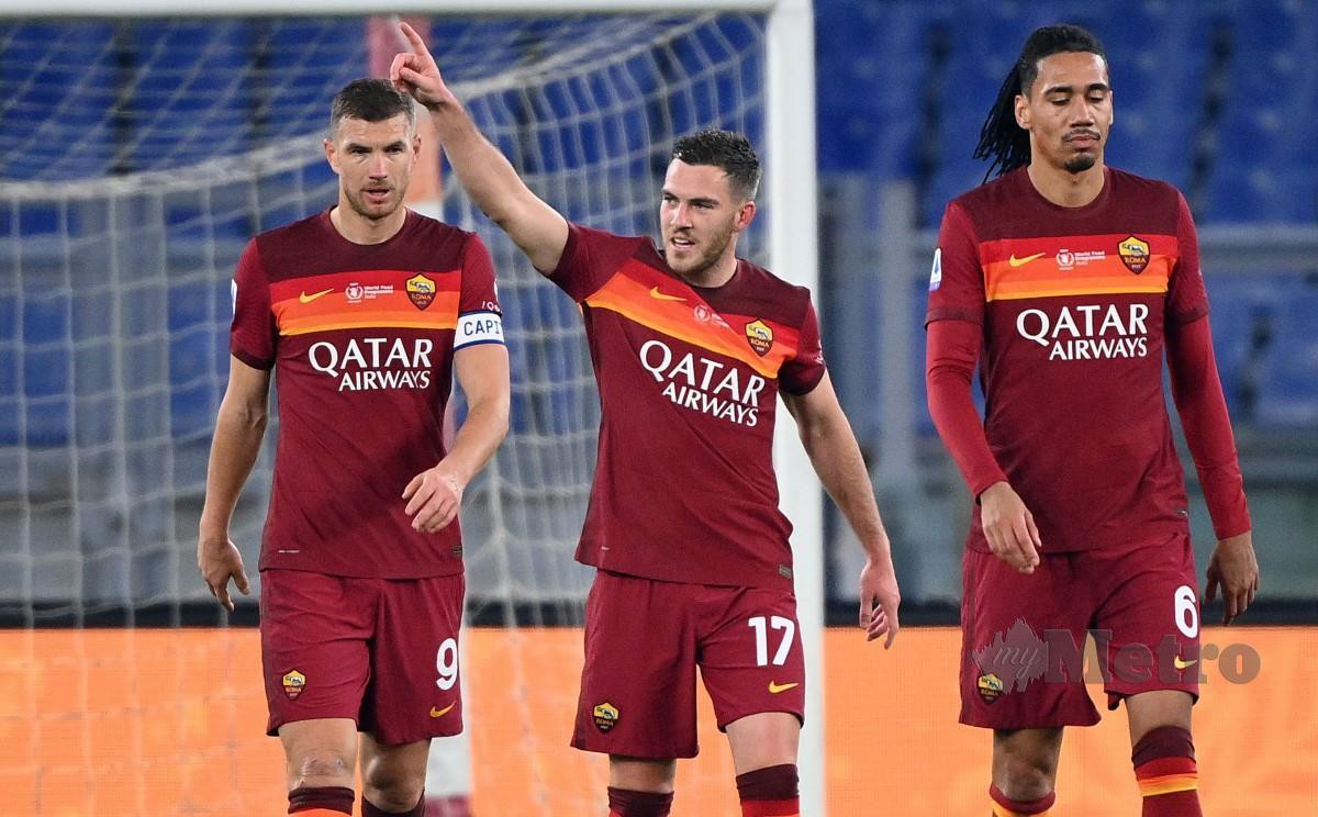 VERETOUT (tengah) meraikan gol menerusi sepakan penalti untuk membantu Roma mencatat kemenangan 3-1 ke atas Torino. FOTO AFP
