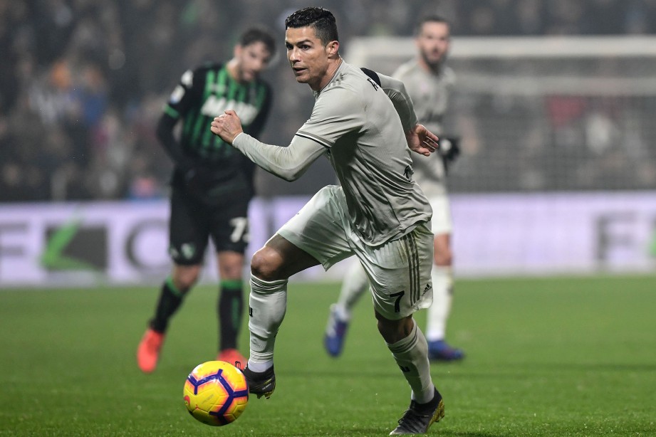 Cristiano Ronaldo meledak satu gol ke-18 liga. FOTO AFP