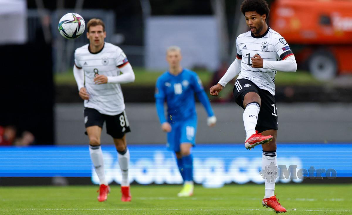 GNABRY (kanan) meledak gol pembukaan buat Jerman ketika menumpaskan Iceland pagi tadi. FOTO AFP