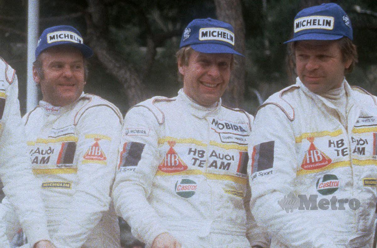 MIKKOLA (tengah) meraikan kejayaan menduduki tempat ketiga Rali Monte Carlo 1984 bersama rakan sepasukannya, Arne Hertz (kanan). FOTO AFP