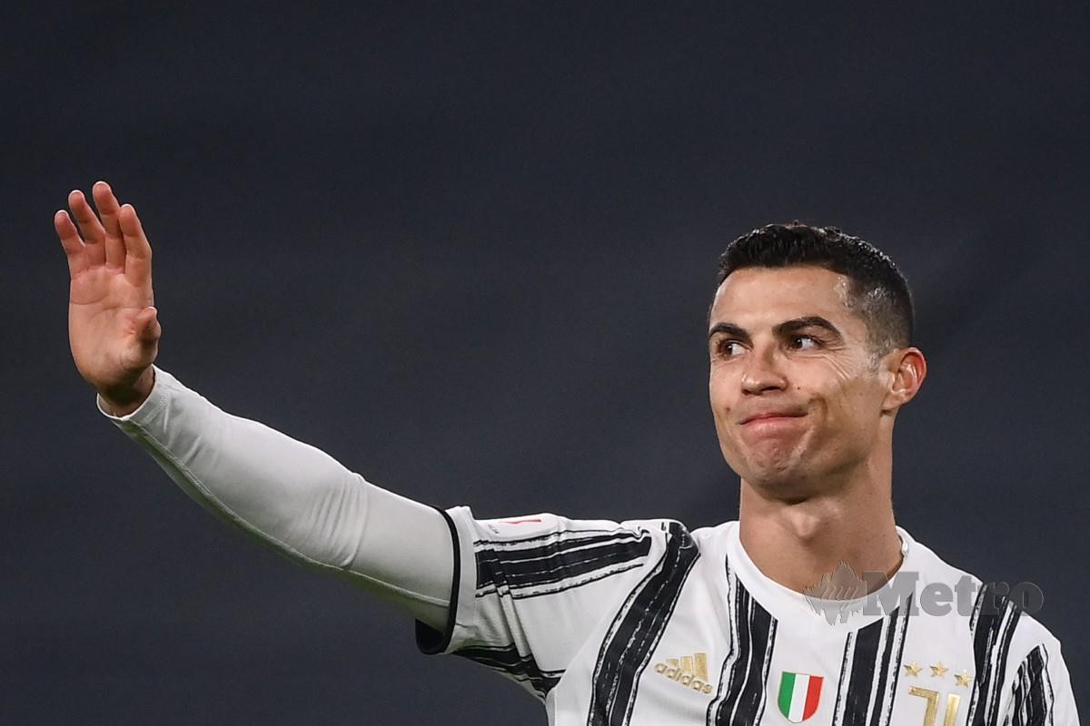 IKATAN yang kuat antara Ronaldo dan United. FOTO AFP