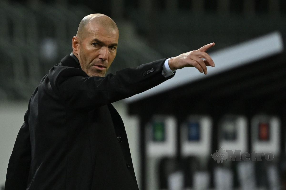 ZIDANE meletak jawatan kali kedua selaku pengurus Real. FOTO AFP