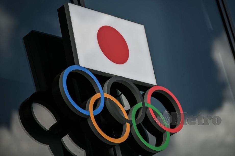 SUKAN Olimpik Tokyo tetap akan dianjurkan tanpa mengira situasi pandemik Covid-19. FOTO AFP 